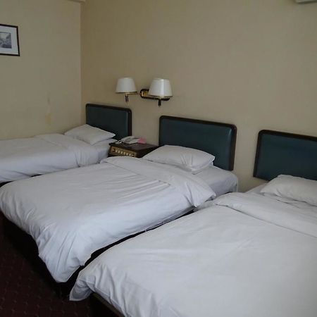 Lin Yuan Hotel Harbin Bagian luar foto